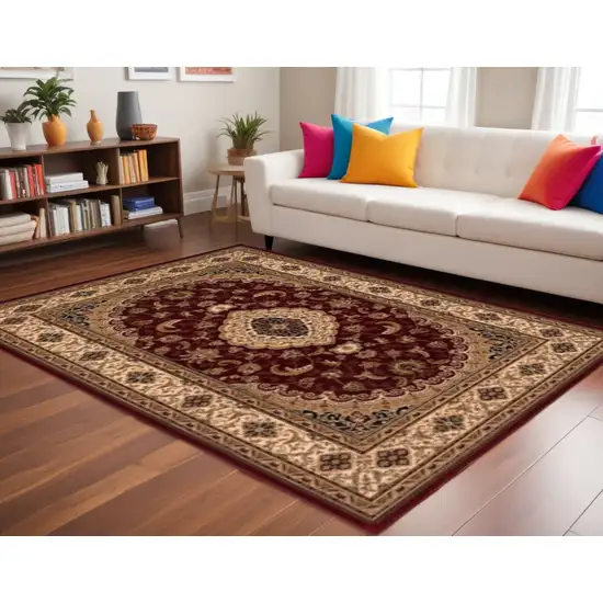 Red and Beige Floral Medallion Power Loom Area Rug Photo 1