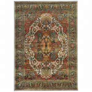 Photo of Red Gold Orange Green Ivory Rust And Blue Oriental Power Loom Stain Resistant Area Rug