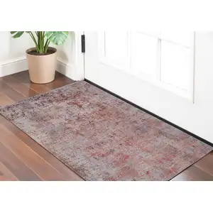 Photo of Red Gray and Pink Abstract Power Loom Area Rug