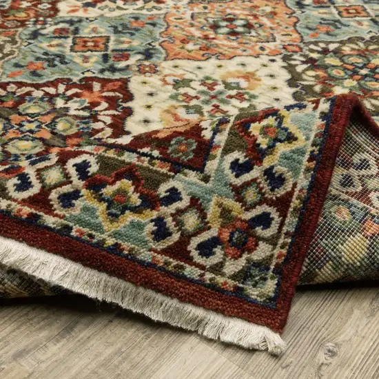 Red Rust Navy Light Blue Brown Orange Ivory And Gold Oriental Power Loom Stain Resistant Area Rug With Fringe Photo 9