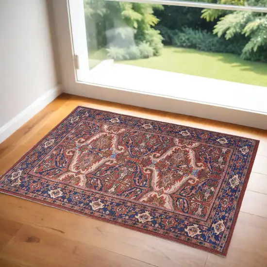 Red Tan And Blue Floral Power Loom Area Rug Photo 1