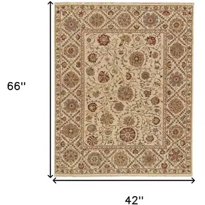 Photo of Red Tan and Gold Wool Oriental Hand Knotted Area Rug