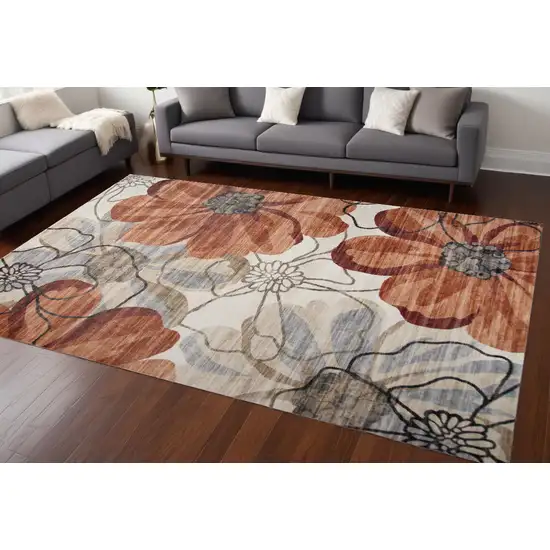 Red and Beige Floral Distressed Area Rug Photo 1