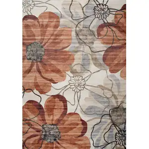 Photo of Red and Beige Floral Distressed Area Rug