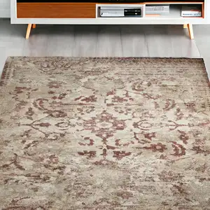 Photo of Red and Beige Oriental Area Rug