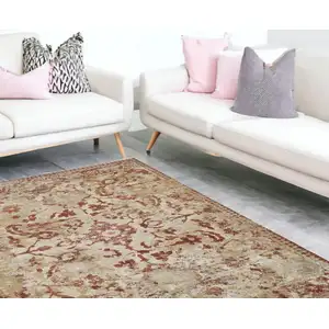 Photo of Red and Beige Oriental Area Rug