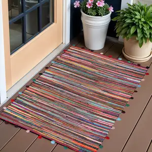 Photo of Red and Black Striped Hand Woven Area Rug With Fringe