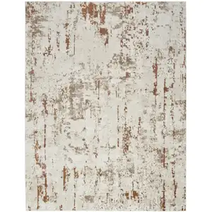 Photo of Red and Ivory Abstract Power Loom Area Rug