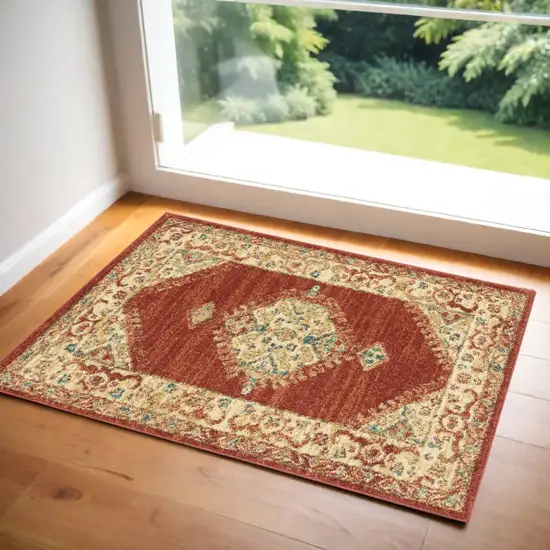 Red and Ivory Medallion Power Loom Area Rug Photo 1