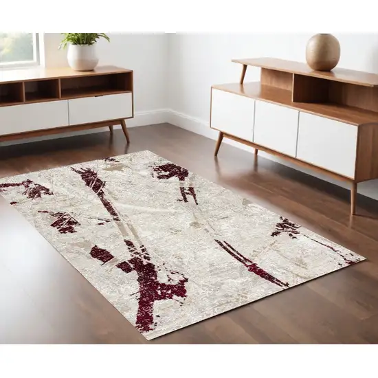 Red and Ivory Abstract Power Loom Area Rug Photo 1