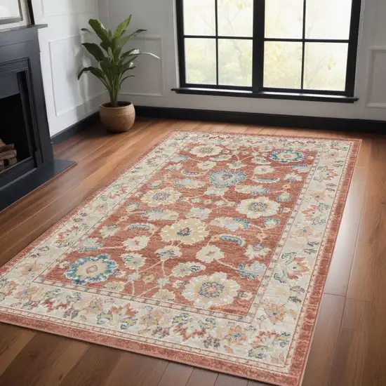 Red and Ivory Oriental Power Loom Area Rug Photo 1