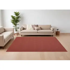 Photo of Red and Tan Hand Woven Area Rug