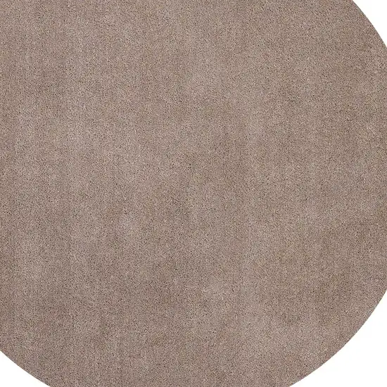 Round Beige Plain Indoor Area Rug Photo 5