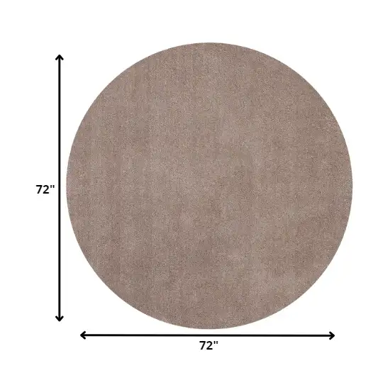 Round Beige Plain Indoor Area Rug Photo 2