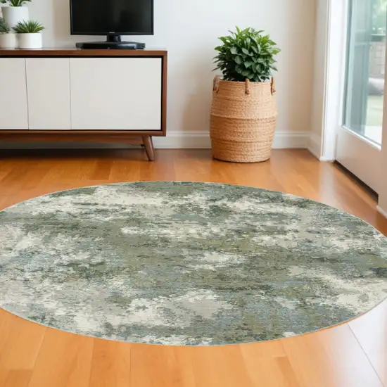 8' Blue Green Round Power Loom Area Rug Photo 1