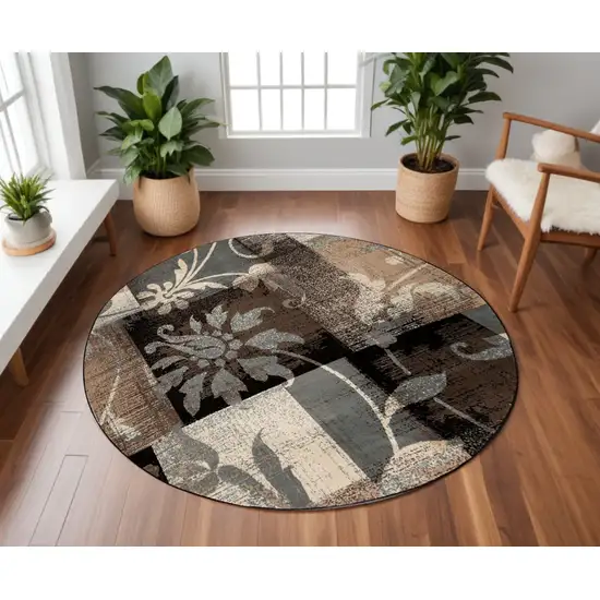 8' Beige Brown and Gray Floral Distressed Round Rug Photo 1