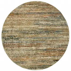 Photo of Round Gold and Green Abstract Area Rug