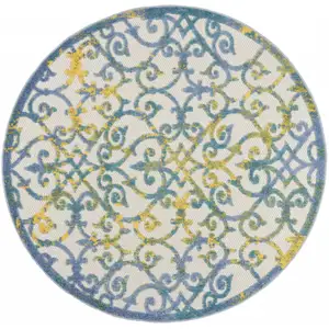 Photo of Round Ivory and Blue Indoor Outdoor Area Rug