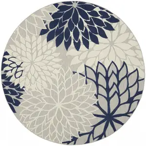 Photo of Round Ivory and Navy Indoor Outdoor Area Rug