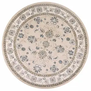 Photo of Round  Polypropylene Beige or  Ivory  Area Rug