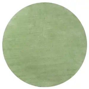 Photo of Round Spearmint Green Plain Indoor Area Rug