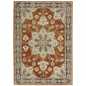 Photo of Rust Beige Teal Blue And Gold Oriental Power Loom Stain Resistant Area Rug