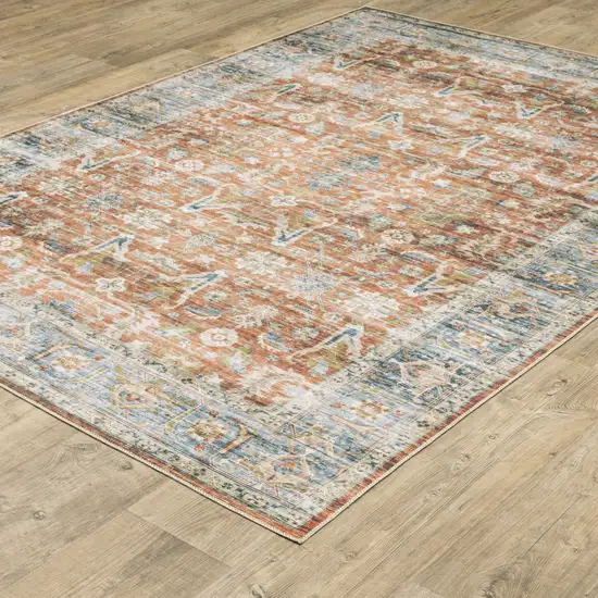 Rust Blue Ivory And Gold Oriental Printed Stain Resistant Non Skid Area Rug Photo 6