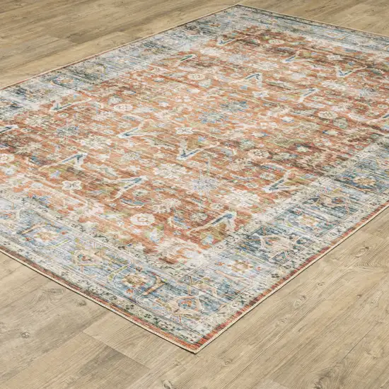 Rust Blue Ivory And Gold Oriental Printed Stain Resistant Non Skid Runner Rug Photo 6