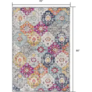 Photo of Rust Distressed Floral Area Rug