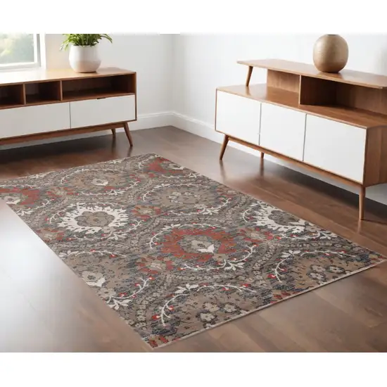 Rust Floral Stain Resistant Area Rug Photo 1