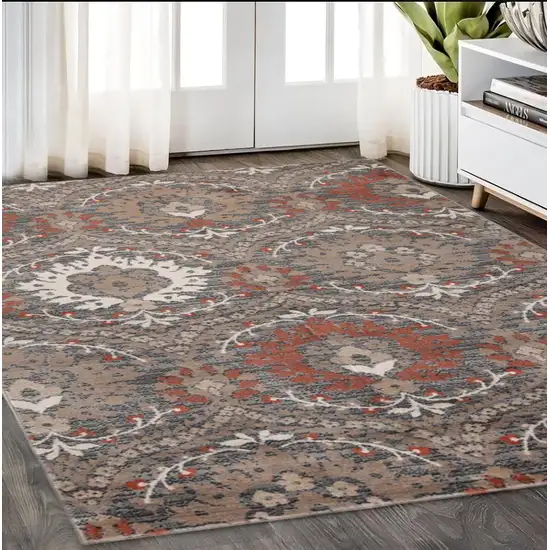 Rust Floral Stain Resistant Area Rug Photo 1