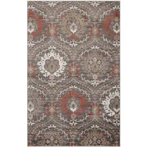 Photo of Rust Floral Stain Resistant Area Rug