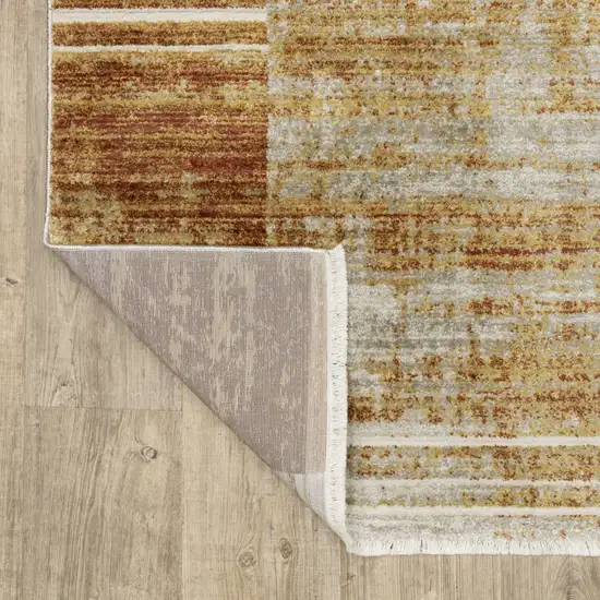 Rust Gold Blue Grey Ivory And Tan Geometric Power Loom Stain Resistant Area Rug With Fringe Photo 8