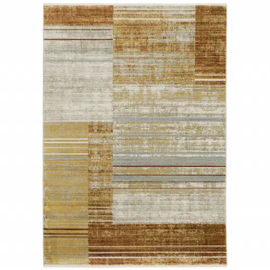 Rust Gold Blue Grey Ivory And Tan Geometric Power Loom Stain Resistant Area Rug With Fringe Photo 1