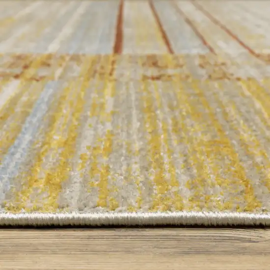 Rust Gold Blue Grey Ivory And Tan Geometric Power Loom Stain Resistant Area Rug With Fringe Photo 7