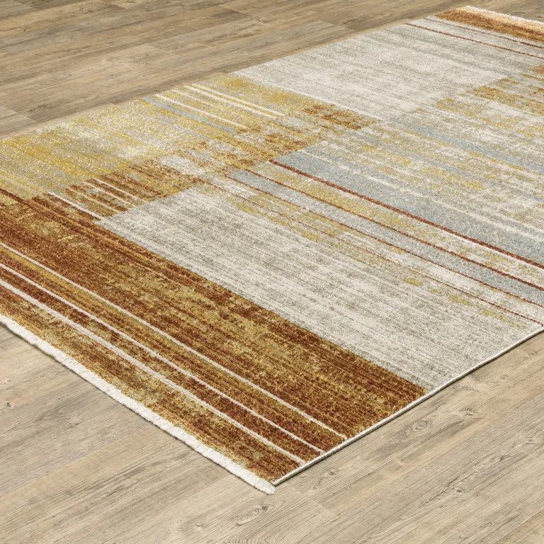 Rust Gold Blue Grey Ivory And Tan Geometric Power Loom Stain Resistant Area Rug With Fringe Photo 5