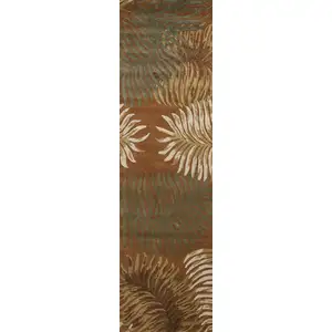 Photo of Rust Orange Hand Tufted Tropical Leaves Indoor Runner Rug