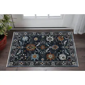 Photo of Rust Oriental Area Rug With Fringe