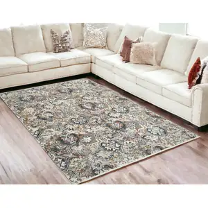 Photo of Rust Oriental Distressed Area Rug With Fringe