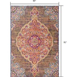 Photo of Rustic Orange Medallion Area Rug