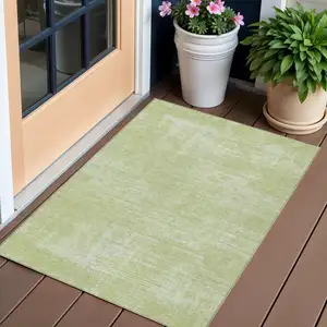 Photo of Sage Artichoke Green And Mint Green Abstract Washable Indoor Outdoor Area Rug