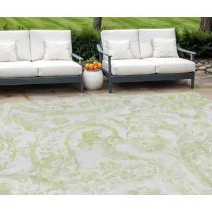 Photo of Sage Green And Ivory Paisley Washable Indoor Outdoor Area Rug