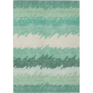 Photo of Sage Green And Ivory Striped Washable Indoor Outdoor Area Rug