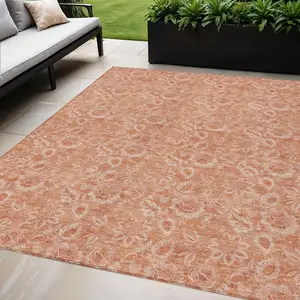 Photo of Salmon And Copper Floral Washable Indoor Outdoor Area Rug