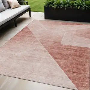 Photo of Salmon And Ivory Abstract Washable Indoor Outdoor Area Rug