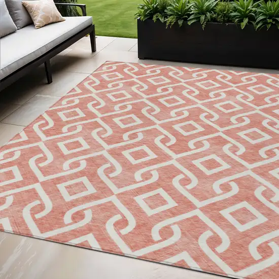 Salmon And Ivory Geometric Washable Indoor Outdoor Area Rug Photo 1