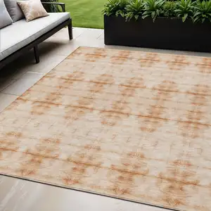 Photo of Salmon And Ivory Geometric Washable Indoor Outdoor Area Rug