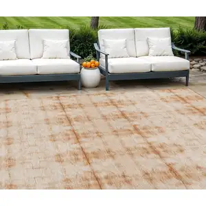 Photo of Salmon And Ivory Geometric Washable Indoor Outdoor Area Rug