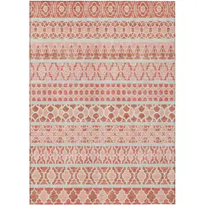 Photo of Salmon Beige And Copper Quatrefoil Washable Indoor Outdoor Area Rug