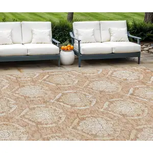 Photo of Salmon Copper And Ivory Medallion Washable Indoor Outdoor Area Rug